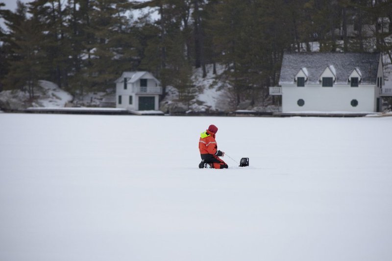 Experience the Thrill of Ice Fishing in Canada's Frozen Lakes in Canada
